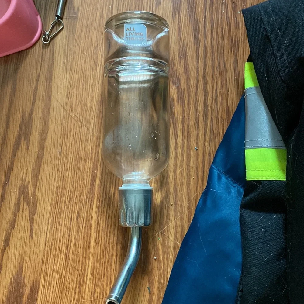 Hamster hut, water bottle, and food bowl
